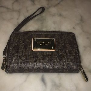Michael Kors Brown Signature PVC Zip Wally EUC